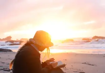 Journaling on the west coast of the south island at sunset! Mid road trip.