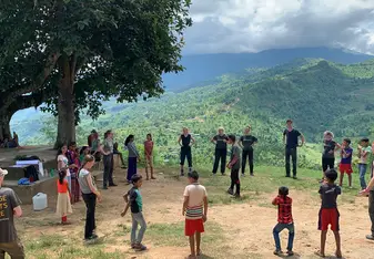 This is a picture of my group playing games with the children in our community one day. 
