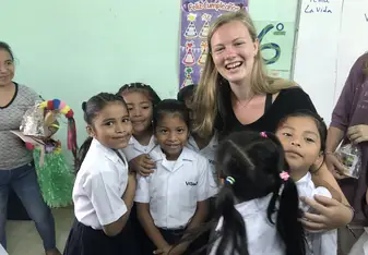 a picture of me with local girls from the school I taught at!