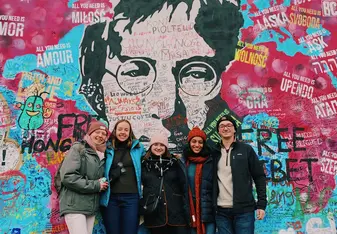 Me and some new friends in front of the Lenon wall in Prague!