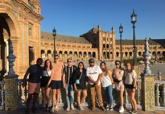 Students pose in the famous Plaza de España