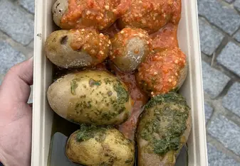 Visit a local market and try traditional dishes from Spain