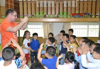 Teaching a class of kindergarten children in Hangzhou, China. 