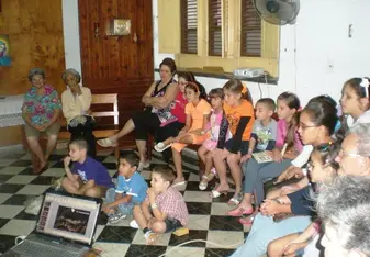 Teaching basic English language to Cuban families.