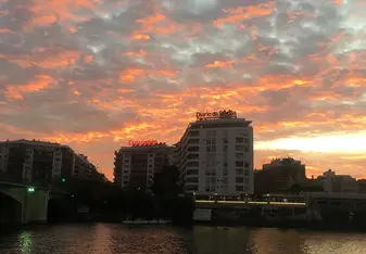 Sunset over the river in Seville, Spain.
