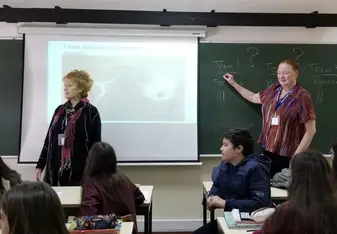 Team “teaching” with Global Volunteers Nancy and Pamela