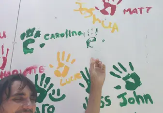 Me putting my name on the wall in Jalova
