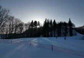 Snowy slopes at sunset