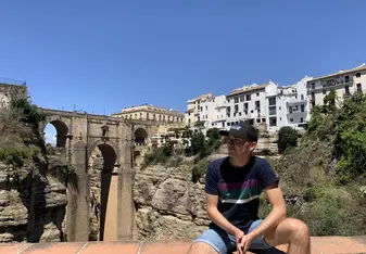 Me sitting in front of a bridge in Ronda, a town close to Malaga