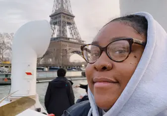 Me in front of the Eiffel Tower.