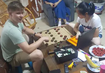 Me playing chinese chess against a child from the host family.