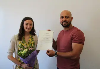 Sarah receiving her certificate