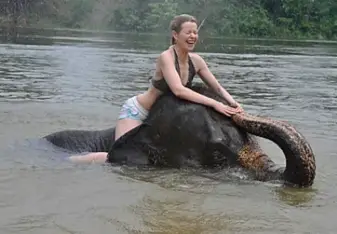 Me on an elephant in the river in Phrae