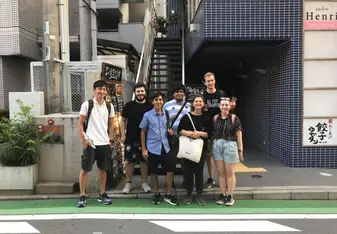 students posing on the street