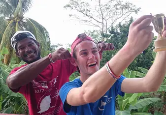 Gary takin a selfie with a local man
