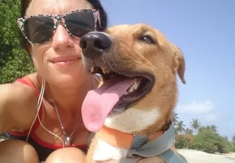 Alexandra posing with her dog