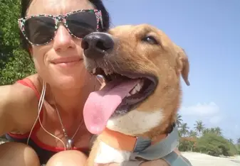 Alexandra posing with her dog