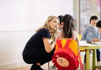 Teacher examining work