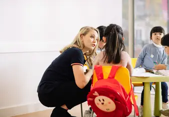 Teacher examining work