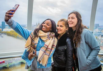 Students taking a selfie in London