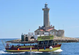 Our Sandra boat infront of the lighthouse Porer