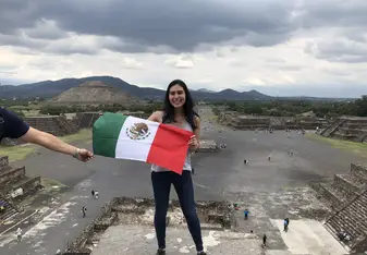Girl holding Mexico flag