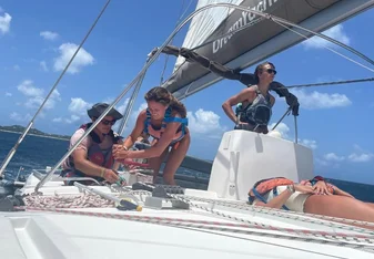 Group of teens sailing a yacht