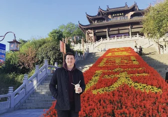 Teacher in Chinese garden. 
