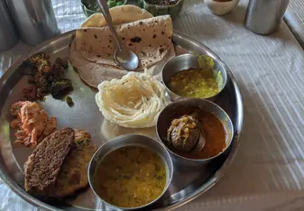 Vineeta Chauhan eating traditional indian food