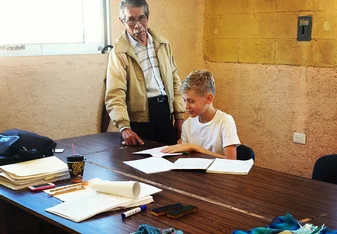 Spanish teacher and student in class