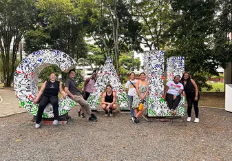 CET Colombia study abroad students pose in front of giant letters spelling "Cali"