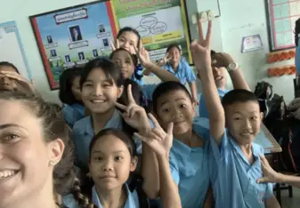 Thai students smiling in a classroom