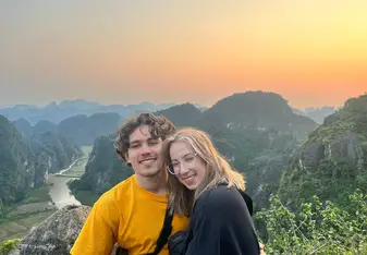 A couple atop a mountain in Ninh Binh, Vietnam