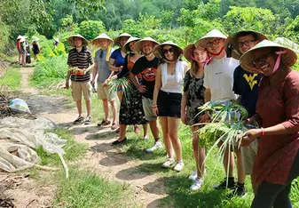 teachers pose for a photo in vietnam