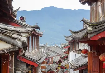 red buildings and roofs with mountain