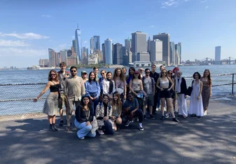 Group of students in front of lower Manhattan