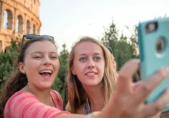 Students by the Colosseum of Rome, Italy.