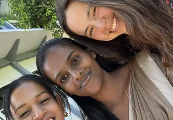 With another volunteer and teacher