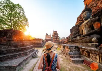 lady walking in Angkor Wat