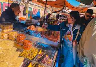 CYA Student shopping at the farmers market