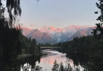 river and mountains at sunset