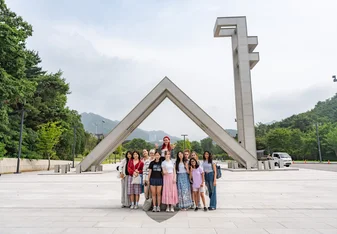 SPARKS Students pose by the gates of Seoul National University