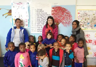 Volunteer with children in South Africa