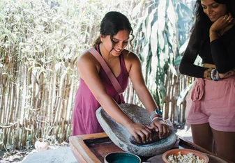Students engaged in Maya cultural immersive learning in Belize.