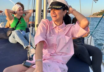 Students enjoying themselves on a sailboat in Lisbon, Portugal
