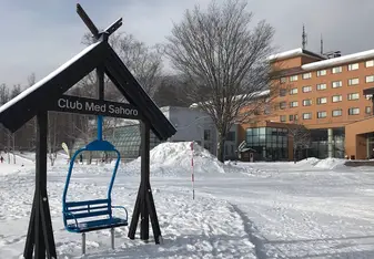Club Med Sahoro entrance view with ski lift sculpture 