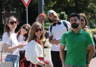 A teacher and students during a Field Trip