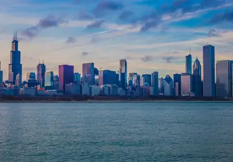 A body of water and the skyline of a city