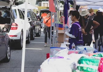 Volunteers distribute vital supplies