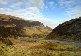 Image of a river running through the hills of the Scottish Highlands